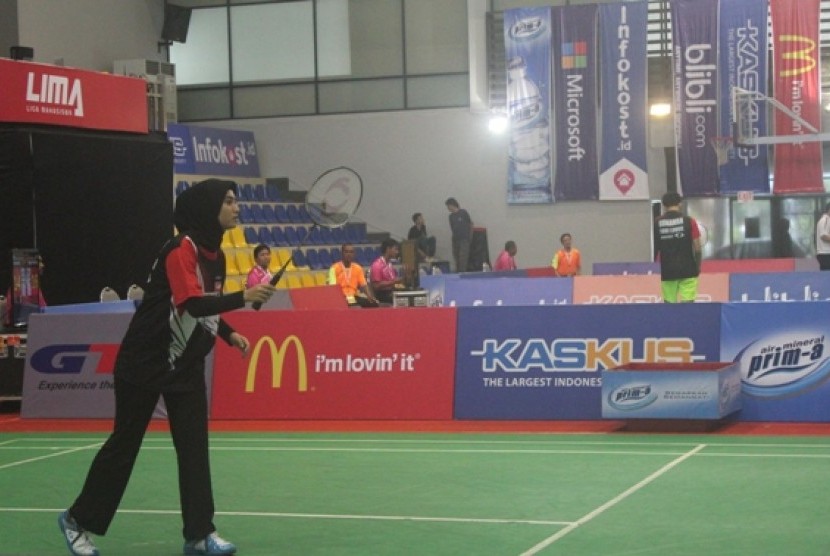 Salah seorang pemain Universitas Budi Luhur di Lima Badminton 2015 Conference Jakarta.