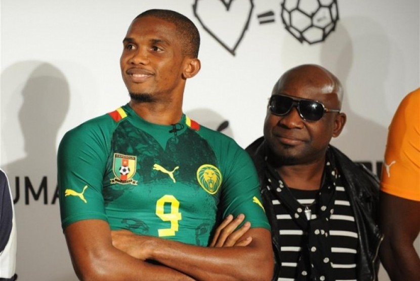 Samuel Eto'o mengenakan seragam timnas Kamerun di Piala Dunia 2014