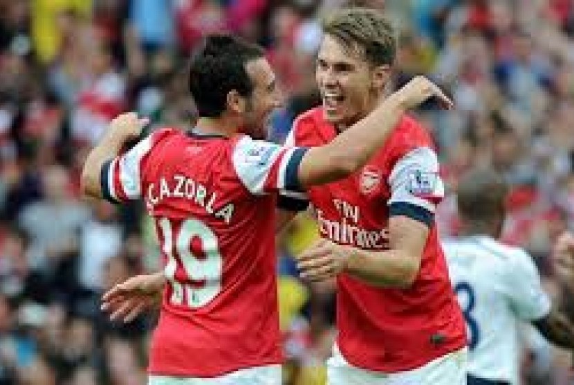 Santi Cazorla dan Aaron Ramsey