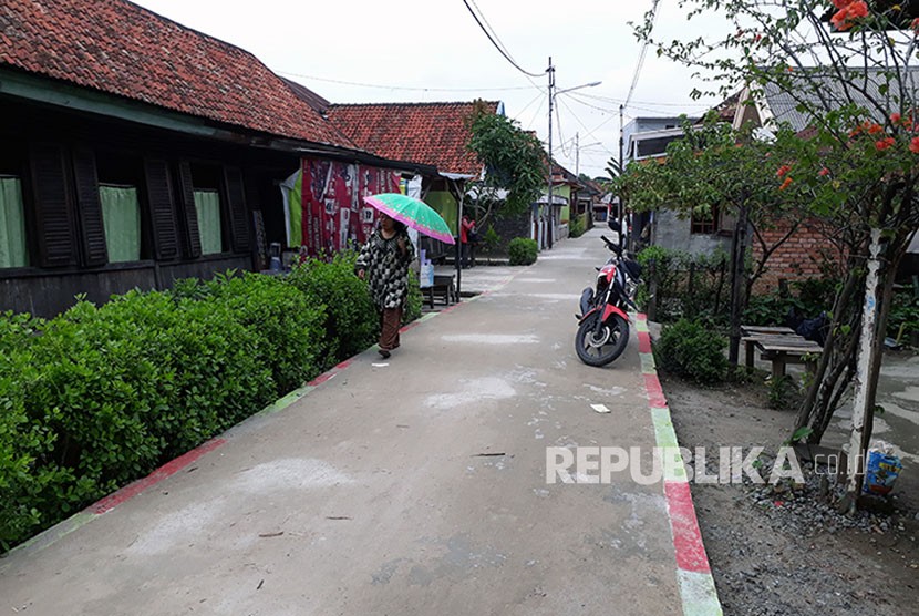Sebagian badan jalan di Kelurahan 36 Ilir Palembang yang sudah selesai dibangu dan direnovasi melalui Program Kotaku (Kota Tanpa Kumuh).