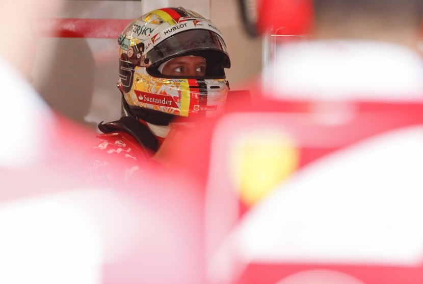 Sebastian Vettel ketika sesi kualifikasi Grand Prix Malaysia, Sabtu (30/9).