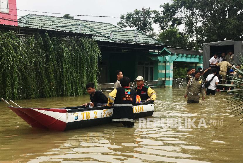 Hujan dengan intensitas tinggi sejak Selasa (22/3/2022) dini hari sebabkan banjir di Samarinda. Ilustrasi.