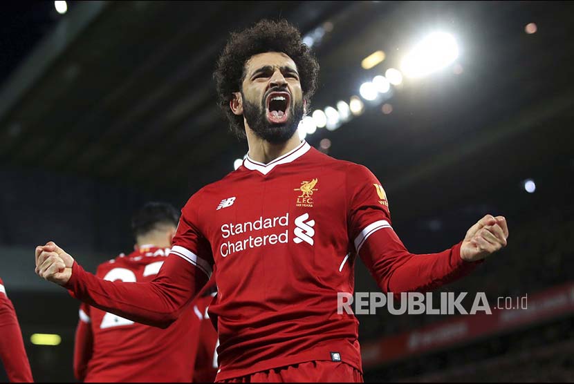 Selebrasi Mohamed Salah setelah mencetak gol kemenangan Liverpool di Stadion Anfield, Sabtu (30/12)
