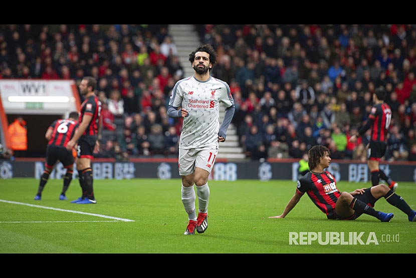 Selebrasi Mohamed Salah setelah mencetak gola pada pertandingan Liga Primer Inggris antara Bournemouth melawan Liverpool di Vitality Stadium, Bournemouth, Inggris, Sabtu (8/12)