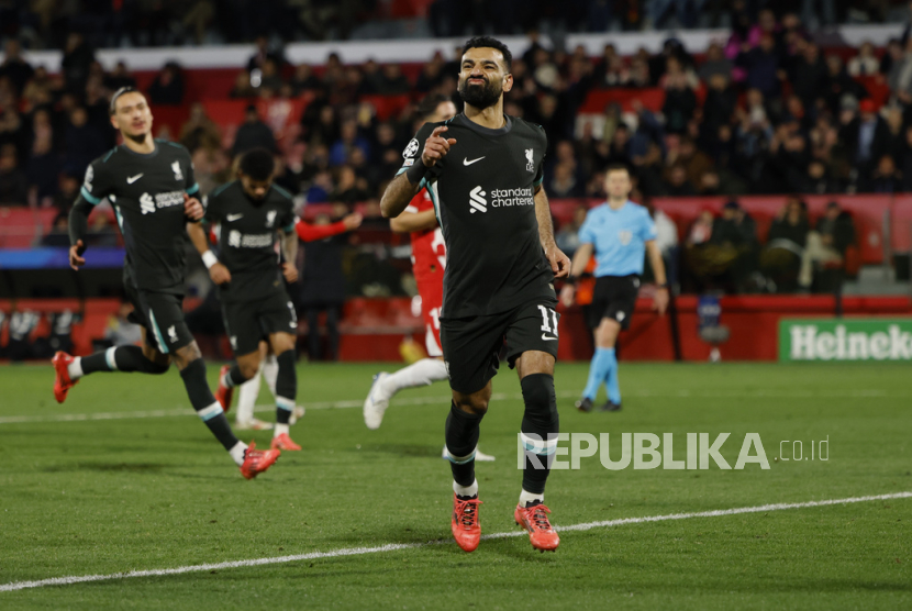 Selebrasi penyerang Liverpool Mohamed Salah selepas mencetak gol ke-50 di Liga Champions dengan menjebol gawang Girona di LIga Champions.