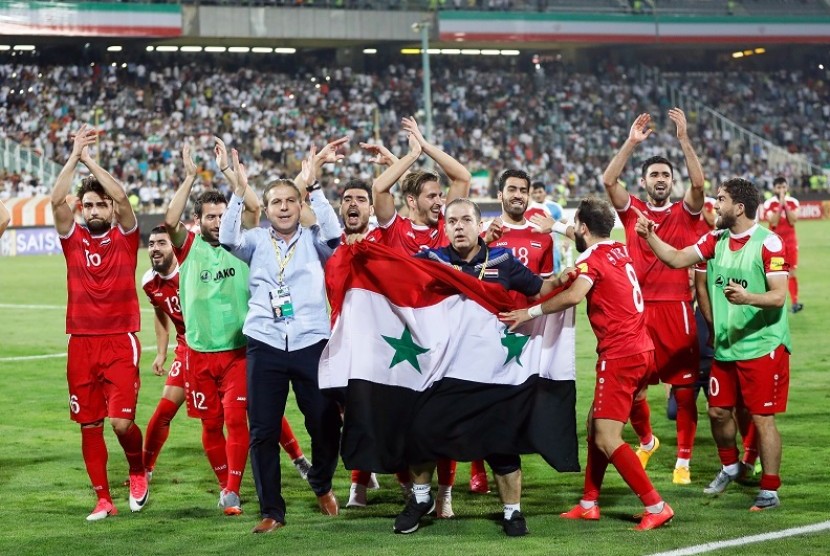 Selebrasi tim Suriah setelah memastikan satu tempat di play-off Piala Dunia 2018 zona Asia.