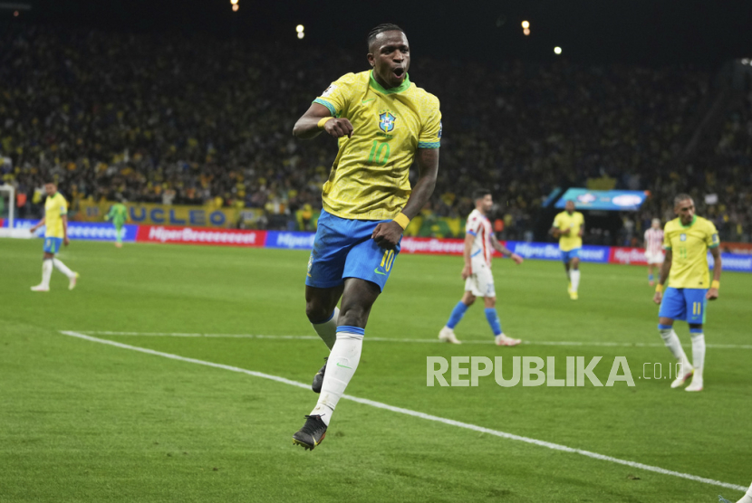 Selebrasi Vinicius Junior setelah mencetak gol untuk Brasil dalam pertandingan melawan Paraguay di Kualifikasi Piala Dunia 2026 Zona Conmebol, Rabu (11/6/2025) pagi WIB.
