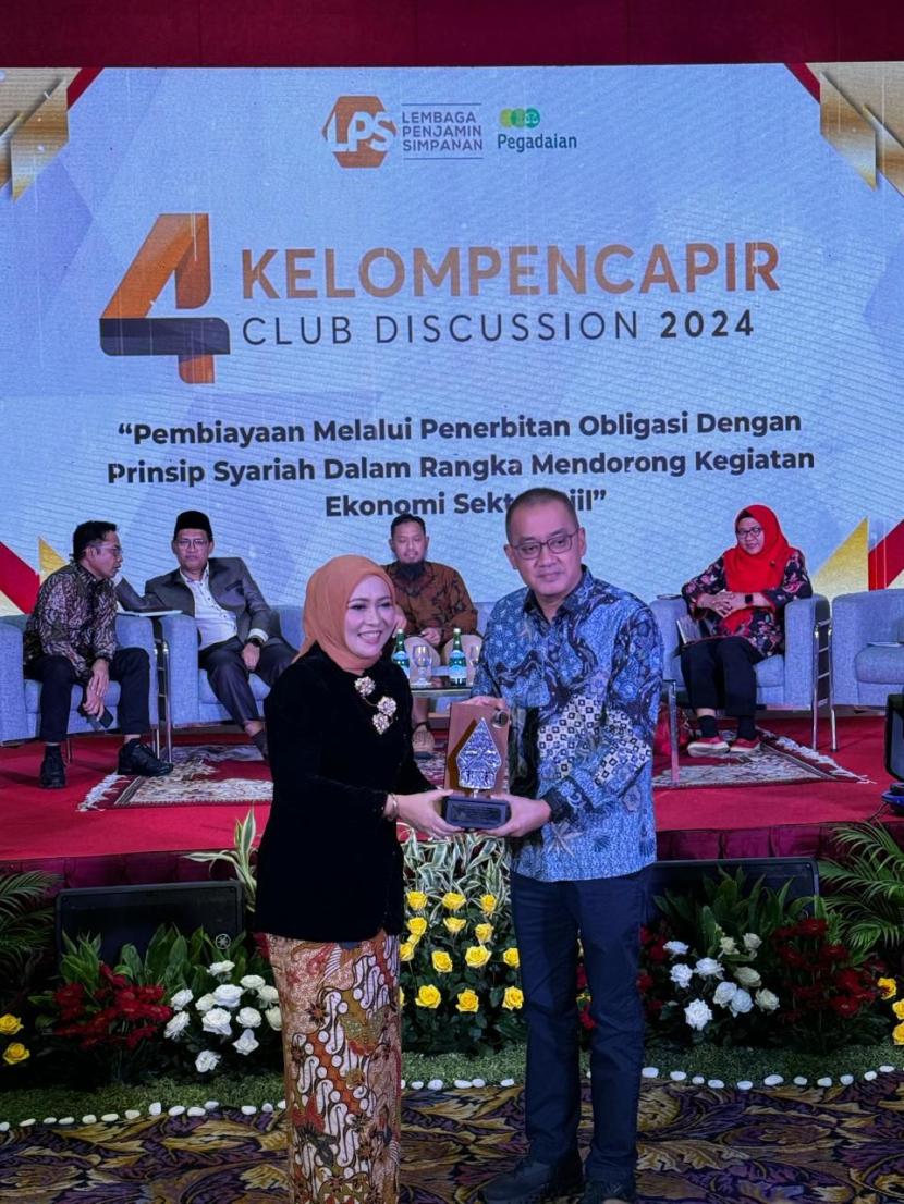 Seminar hukum bertajuk Pembiayaan melalui Penerbitan Obligasi dengan Prinsip Syariah Dalam Rangka Mendorong Ekonomi di Sektor Riil yang digelar untuk memperingati hari ulang tahun Kelompencapir ke-4, di Manhattan Hotel, Kuningan, Jakarta Selatan, Kamis (1/2/2024). 