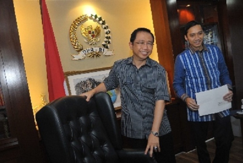 Senior cadre at Democrat Party who also chairman of the House of Representative, Marzuki Alie (left) is at his office in Senayan parliamentary complex, Jakarta, after another party cadre, Edhie Baskoro, submits his resignation letter from his position at t