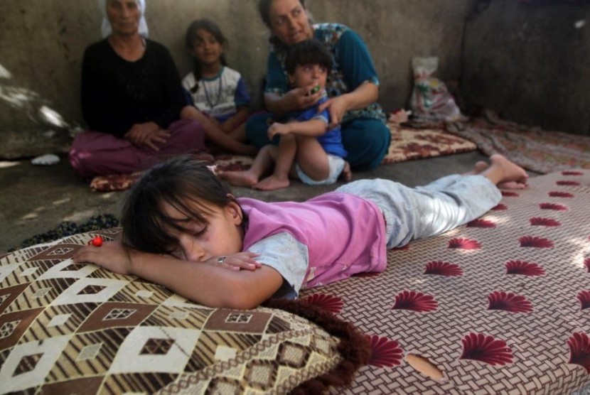 Seorang anak kecil dari kelompok minoritas Yazidi Irak terusir akibat ISIS.