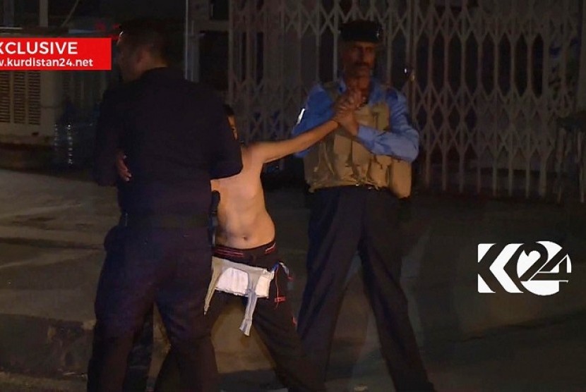 Seorang bocah ditangkap polisi di Kirkuk, Irak, dengan bom melilit di tubuhnya.