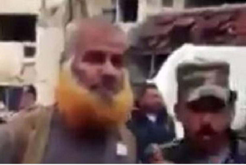 Seorang pria berjanggut merah yang dilaporkan sebagai sepupu pemimpin ISIS, Al-Baghdadi.