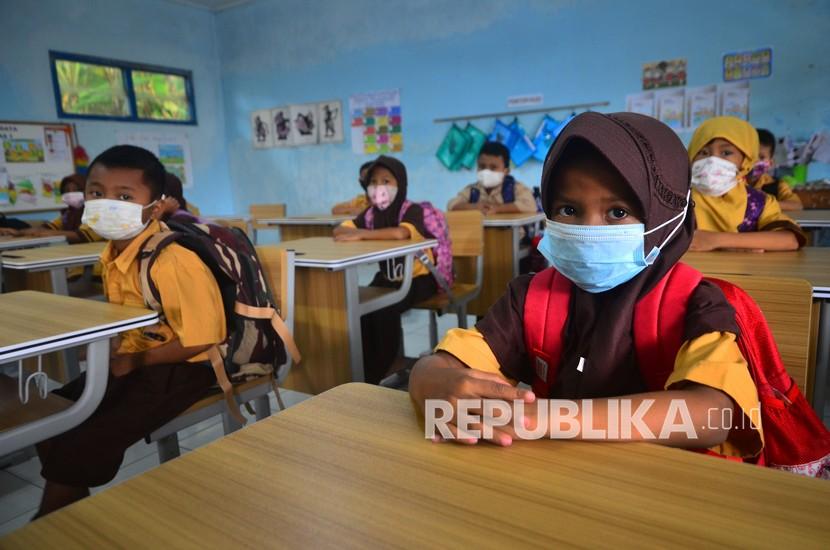 Siswa mengikuti Pembelajaran Tatap Muka (PTM) di SDN 1 Temulus, Mejobo, Kudus, Jawa Tengah, ilustrasi