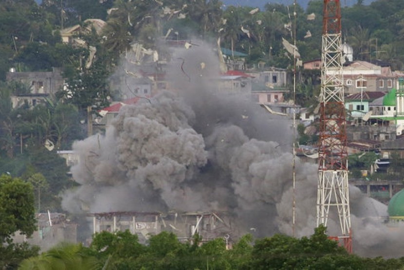 Smoke coming from a blast arises in Marawi city sky, Philippines, early in June 2017.