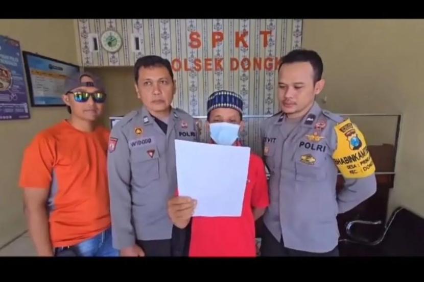 SN, pria paruh baya yang membuat laporan palsu membuat video permintaan maaf.