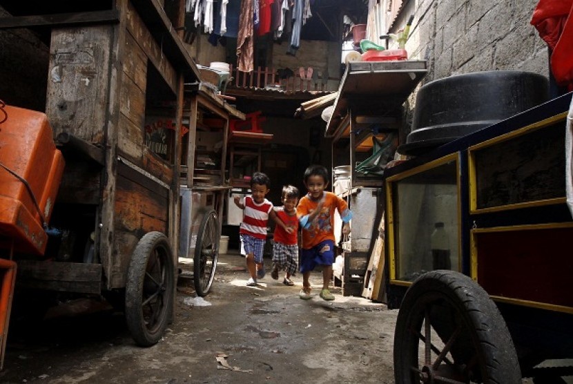 Some kids play in their neighborhood in a slum area in Jakarta. (illustration)