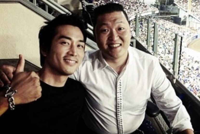 Song Seung Hun dan Psy.