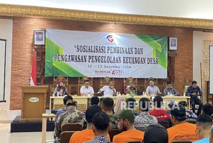 sosialisasi pembinaan pengelolaan dan pengawasan dana desa.