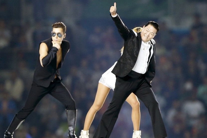 South Korean singer Psy performs during the opening ceremony of the 17th Asian Games in Incheon September 19, 2014