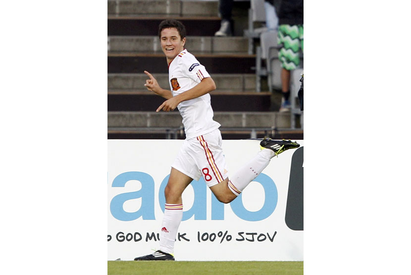 Spain's Herrera celebrates after scoring against Switzerland during their European Under-21 Championship final soccer match in Aarhus