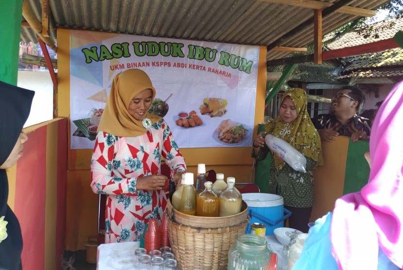 Sri Sulastri atau Tati (40 tahun), tukang jamu yang memanfaatkan fasilitas pembiayaan ultra mikro (UMi), ketika ditemui Republika di Serang, Banten, Jumat (15/3).