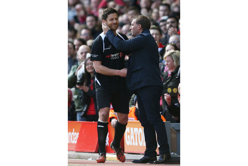  Steven Gerrard All-Stars v Jamie Carragher All-Stars - Liverpool FC Foundation Charity Match - Anfield - 29/3/15 Liverpool manager Brendan Rodgers and Steven Gerrard All Stars' Xabi Alonso 
