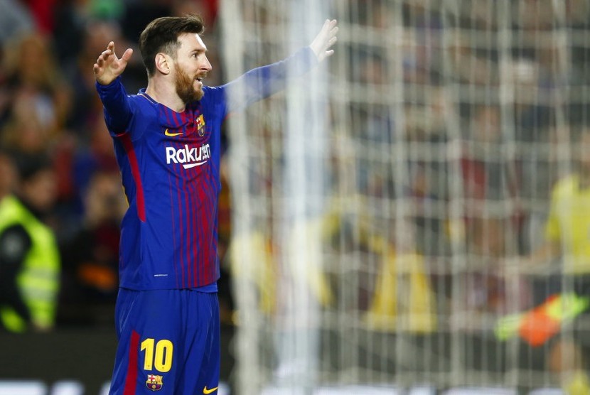 Striker Barcelona, Lionel Messi merayakan gol ke gawang Leganes pada laga La Liga di Camp Nou, Ahad (8/4) dini hari WIB.