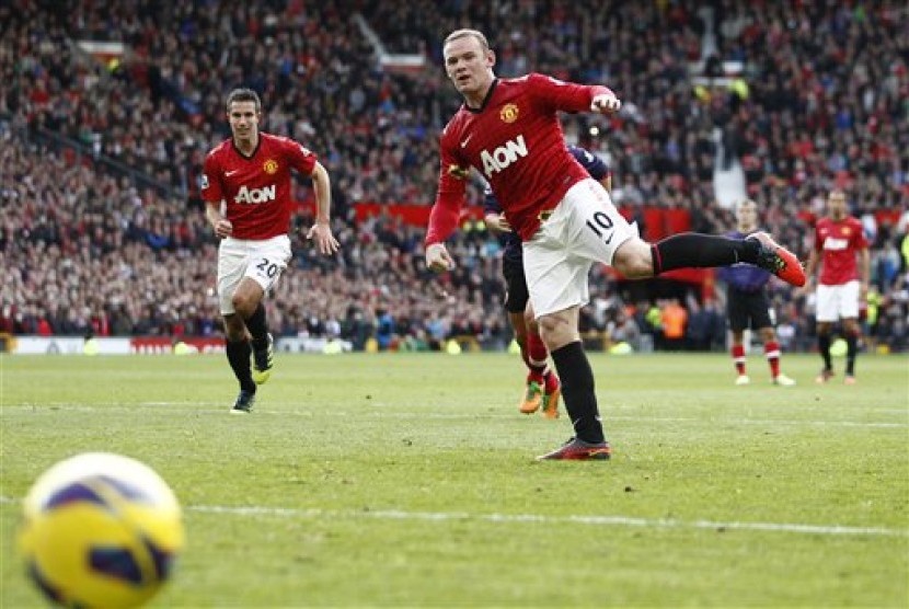 Striker Manchester United, Wayne Rooney, gagal mencetak gol lewat titik putih pada laga melawan Arsenal pada lanjutan Liga Primer Inggris di Old Trafford, Sabtu (3/11).