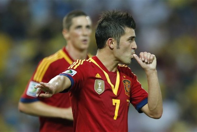 Striker Spanyol David Villa merayakan gol ketujuh ke gawang Tahiti di Piala Konfederasi 2013. Spanyol menang 10-0 dan mencatatkan kemenangan terbesar sepanjang sejarah turnamen tersebut.