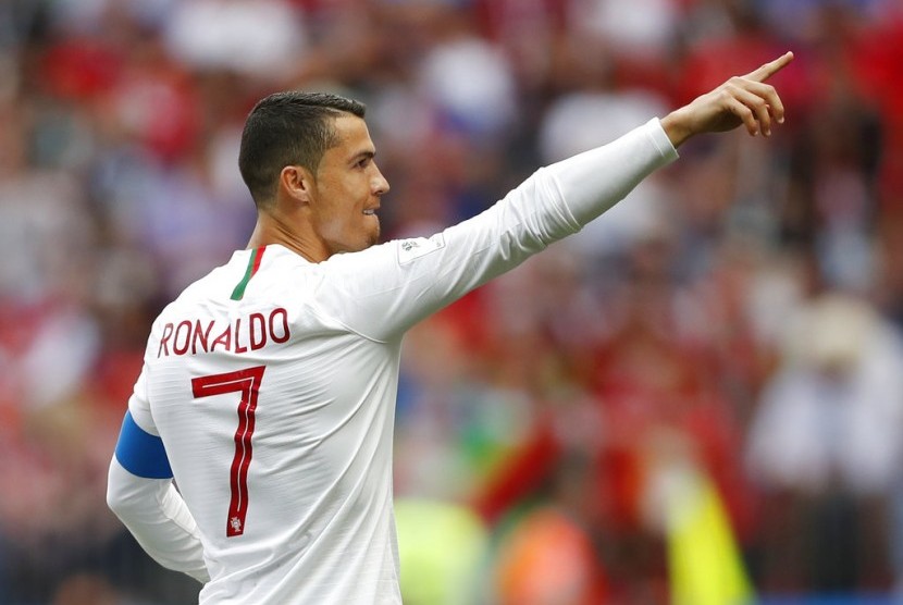 Striker timnas Portugal, Cristiano Ronaldo merayakan gol ke gawang Maroko pada laga Piala Dunia 2018 di Stadion Luzhniki, Moskow, Rusia, Rabu (20/6).