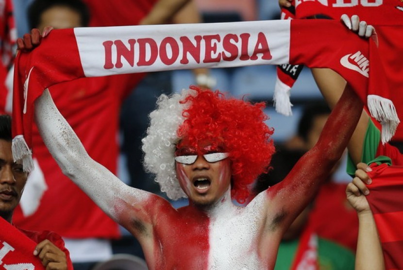 Suporter Timnas Indonesia yang mendukung Elie Aiboy dkk di Stadion Bukit Jalil Malaysia