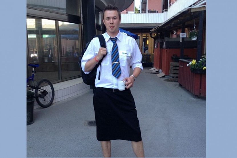 Swedish train driver Martin Akersten poses wearing a skirt in this May 31 2013 photo taken in Stockholm with his cell phone. 