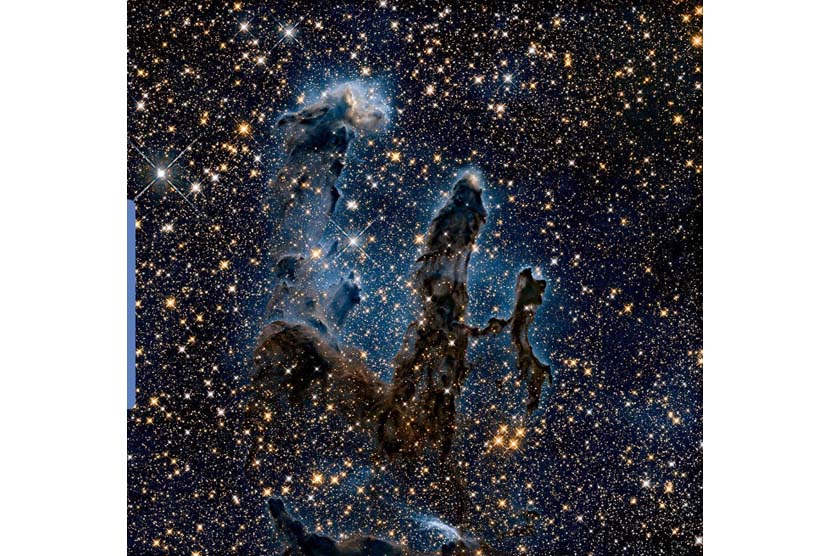 Ilmuwan NASA merilis foto inframerah terbaru dari ‘Pillars of Creation’ atau pilar penciptaan yang ikonik.