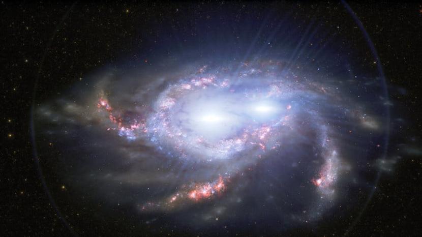 Telskop Hubble mengidentifikasi bukan hanya satu tapi dua kuasar di galaksi yang bergabung.