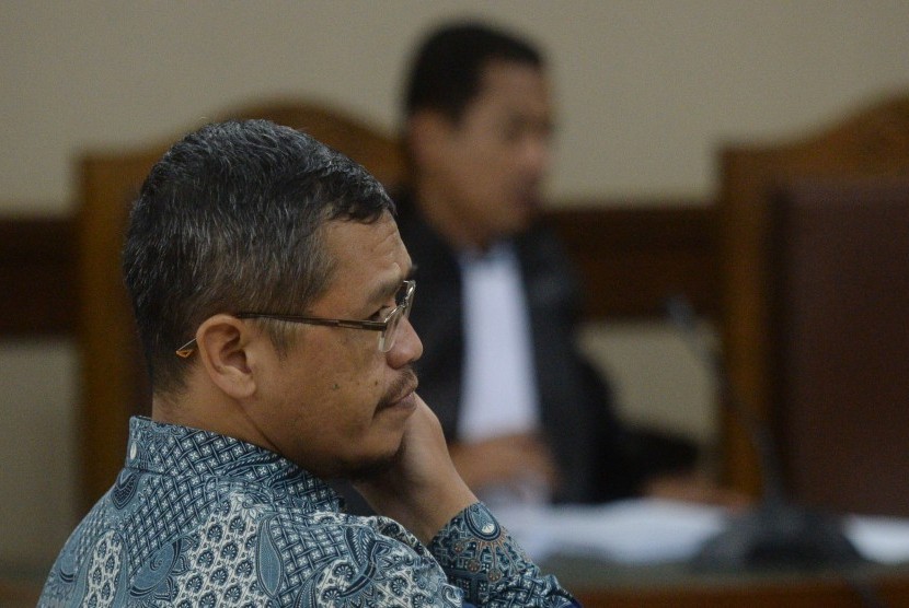Terdakwa kasus suap proyek pembangunan jalan di Kementerian PUPR Yudi Widiana mengikuti sidang lanjutan di Pengadilan Tipikor, Jakarta, Rabu (7/3). Sidang politisi PKS itu beragenda mendengarkan pledoi terdakwa. 