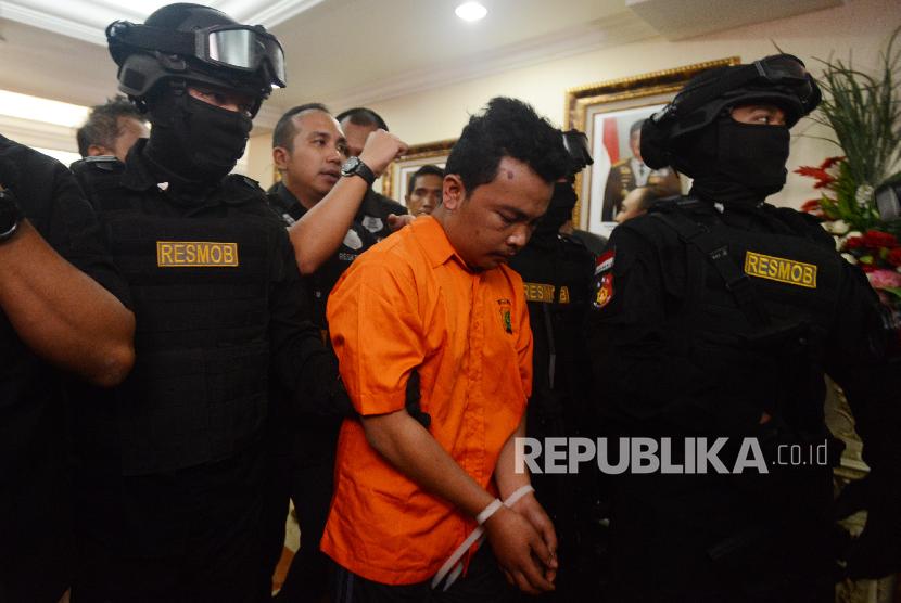 HS, suspect in homicide case of a family of four in Bekasi, West Java.