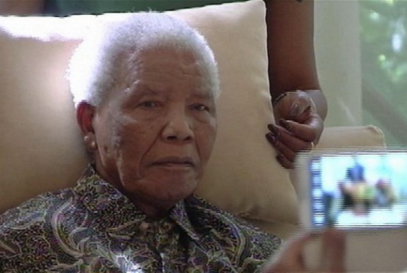 The ailing anti-apartheid icon Nelson Madela is filmed last April. The office of South Africa's president said Saturday, June 8, 2013 that Mandela has been taken to a hospital because of a lung infection. 