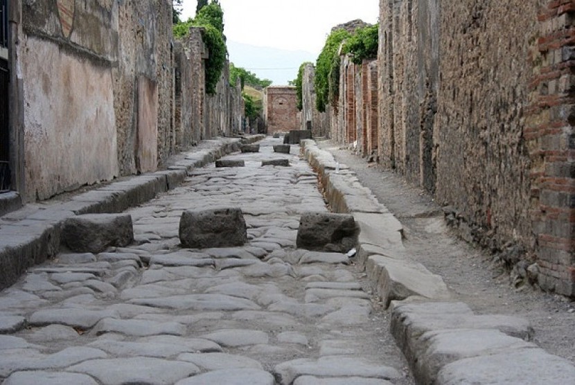 The blocks in the road allowed pedestrians to cross the street without having to step onto the road itself which doubled up as Pompeii's drainage and sewage disposal system. (file photo)