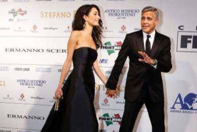 The news on George Clooney (left) and Amal Alamuddin appears on Entertainment section on preview.msn.com (illustration)