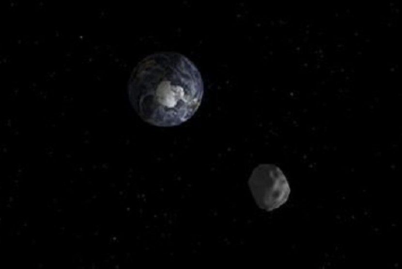 The passage of asteroid 2012 DA14 through the Earth-moon system, is depicted in this handout image from NASA. 