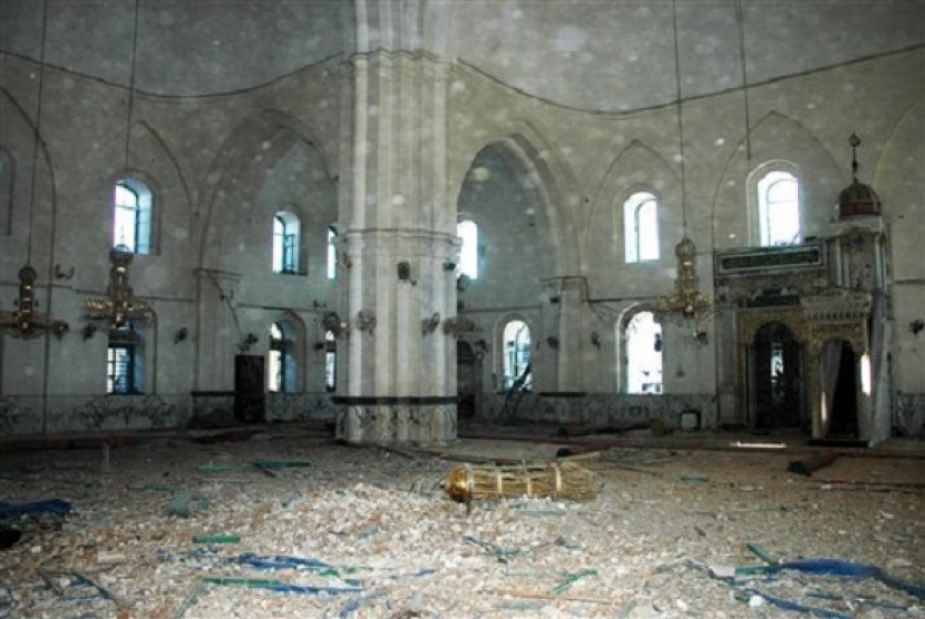 The photo by Syrian official news agency SANA, shows the inside of the Khalid Ibn al-Walid Mosque in the heavily disputed northern neighborhood of Khaldiyeh, in Homs, Syria.