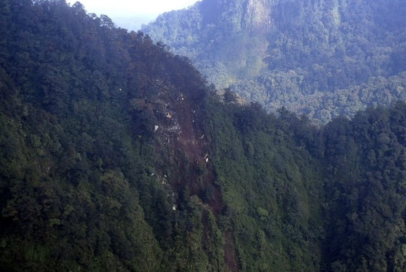 The wreckage of a missing Sukhoi Superjet-100 are scattered on the mountainside in Bogor, West Java, Indonesia. 