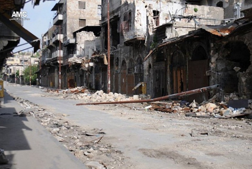 This citizen journalism image provided by Aleppo Media Center AMC which has been authenticated based on its contents and other AP reporting, shows damaged buildings during battles between the rebels and the Syrian government forces, in Aleppo, Syria, Thurs