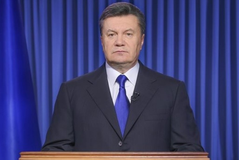This Feb. 19, 2014, file photo shows Ukrainian President Viktor Yanukovych addressing the nation on a live TV broadcast in Kiev, Ukraine. 