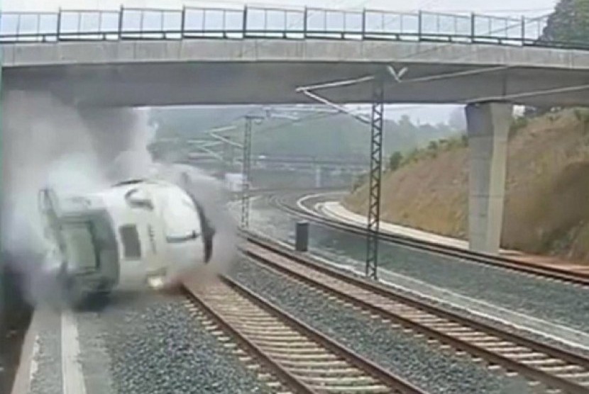 This image taken from security camera video shows a train dreailing in Santiago de Compostela, Spain, on Wednesday. 