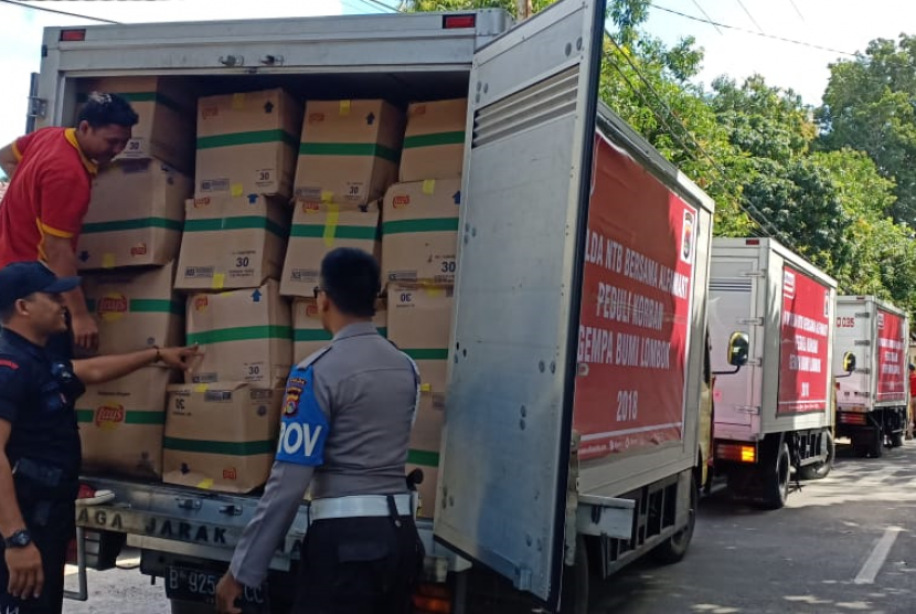 Tiga truk bantuan dari Alfamart untuk korban gempa Lombok.