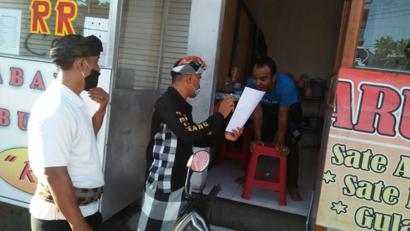Tim Satuan Tugas Desa saat giat Monitoring dan Evaluasi (Monev) di Denpasar, Bali.
