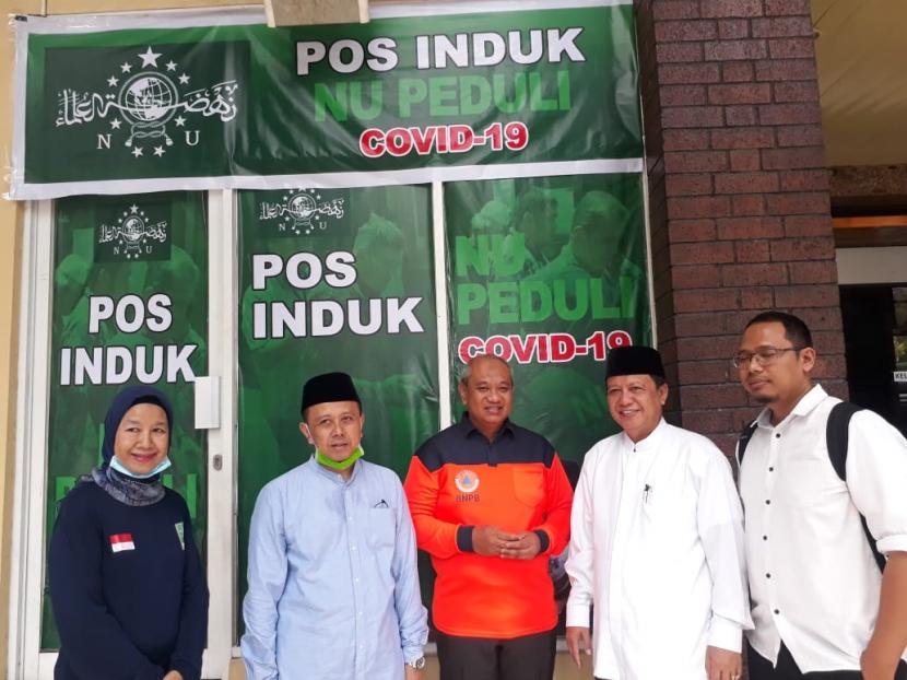 Tim satuan tugas (Satgas) PBNU Cegah Covid-19 menggelar acara bertajuk Gerakan Cegah Covid-19 NU di Gedung PBNU, Kramat Raya, Jakarta Pusat, Jumat (13/3). 