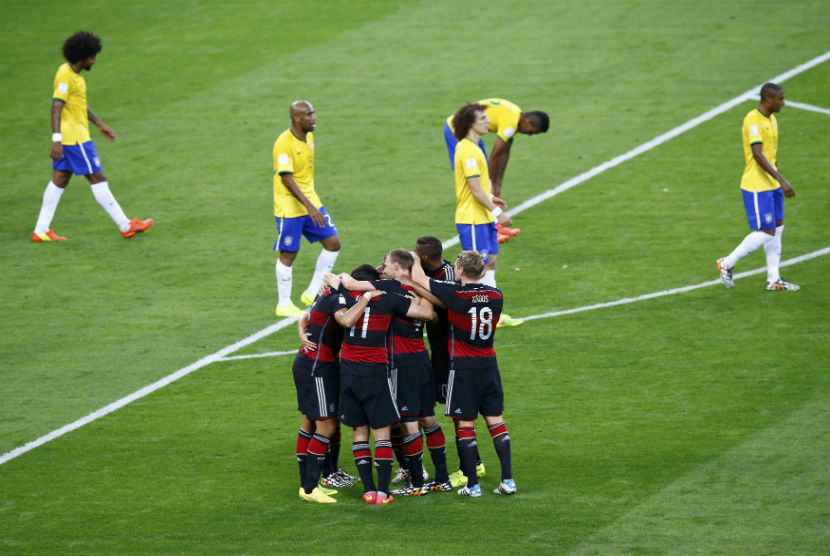 Timnas Jerman melakukan selebrasi usai mengalahkan Brasil di semifinal Piala Dunia 2014 pada Selasa (8/7).