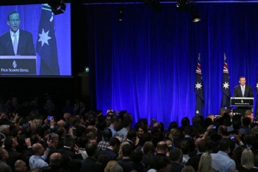 Tony Abbott makes a speech to party supporter in Sydney, Saturday, Sept. 7, 2013, following his win in Australia's national election. 